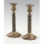 A PAIR OF VICTORIAN EPNS MOUNTED SCOTTISH GRANITE CANDLESTICKS, C1870 with thistle sconce, on