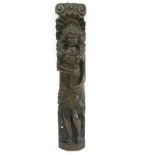 A NORTHERN EUROPEAN CARVED OAK APPLIQUE IN THE FORM OF A LONG HAIRED FIGURE HOLDING FLOWERS, 54CM H,