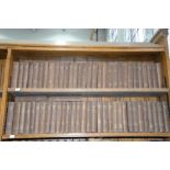 NINE SHELVES OF MISCELLANEOUS BOOKS AND LEATHER BINDINGS, INCLUDING HISTORY AND ENGLISH