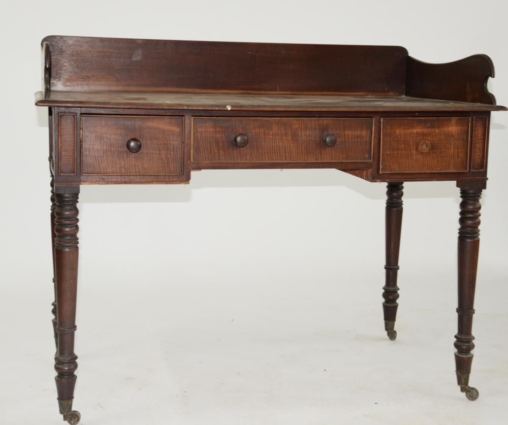 A VICTORIAN MAHOGANY WASHSTAND ON TURNED LEGS AND BRASS CASTORS, 90CM H; 108 X 57CM