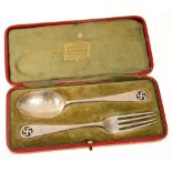 A GEORGE V SILVER FORK AND SPOON WITH PIERCED SWASTIKA TERMINAL, LONDON 1902, CASED, 1OZS 16DWTS++