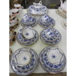 A COALPORT BLUE AND WHITE TEA SERVICE WITH GILT HANDLES AND GADROONED RIM, SERVICE INCLUDING A