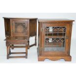 A CARVED OAK STOOL, 37CM H, A CARVED OAK SIDE CABINET, 72CM H; 82 X 33CM AND ANOTHER