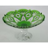 A BOHEMIAN EMERALD GREEN FLASHED AND CUT GLASS COMPORT, 27CM D