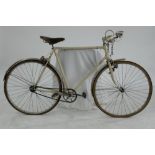 A VINTAGE BICYCLE WITH WHITE PAINTED FRAME AND BROOKES LEATHER SADDLE