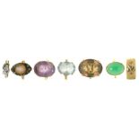 SEVEN RINGS, INCLUDING AN AMETHYST RING IN 9CT GOLD, A SMOKY QUARTZ RING IN GOLD MARKED 9CT, AND A