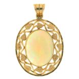 A CABOCHON OPAL PENDANT, THE OPAL 4.5CT APPROX, IN FOLIATE GOLD MOUNT, 3.4 CM X 2.2 CM APPROX++