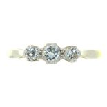 A THREE STONE DIAMOND RING, IN GOLD MARKED 18CT PLAT, 2.5G, SIZE N++LIGHT WEAR CONSISTENT WITH AGE