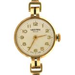 A VERTEX REVUE 9CT GOLD LADY'S WRISTWATCH, 9CT GOLD BRACELET, ROUND CASE 1.8 CM APPROX++RUNNING,