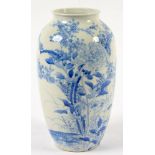 A JAPANESE SHOULDERED OVIFORM BLUE AND WHITE VASE, PAINTED WITH NATURALISTIC PLANTS, 31CM H, EARLY