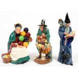 THREE ROYAL DOULTON EARTHENWARE FIGURES OF THE WIZARD, MASK SELLER AND OLD BALLOON SELLER, VARIOUS
