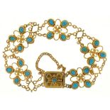 A VICTORIAN TURQUOISE AND GOLD FILIGREE BRACELET, MARKED 15C, 14G++IN GOOD CONDITION