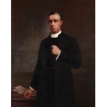 JOSEPH HERBERT BENTLEY, RBA (1866-1934) PORTRAIT OF A CLERGYMAN three quarter length in an interior,