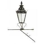 A VICTORIAN BLACK PAINTED METAL AND ZINC GAS LANTERN 80cm h, wrought iron bracket (2)++Lacking one