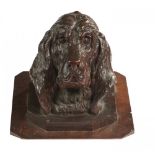 A WALNUT CARVING OF THE HEAD OF A DOG, LATE 19TH C possibly from a mirror or other frame and re-