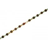 A FOILED GARNET AND TURQUOISE NECKLET, 19TH C in gold, 36cm l++In good condition, possibly longer