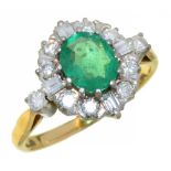 AN EMERALD AND DIAMOND RING the oval emerald 0.9ct approx, the baguette and brilliant cut diamonds