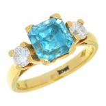A BLUE ZIRCON AND DIAMOND RING the square zircon 2.5ct approx, the brilliant cut diamonds 0.4ct