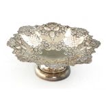 AN EDWARD VII PIERCED SILVER FRUIT BOWL die stamped with fruit and shells, 23.5cm diam, by William