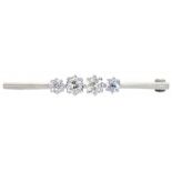 A DIAMOND BAR BROOCH the knife wire with four old cut diamonds, in white gold, 3.9g++Adapted from
