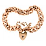 A GOLD CURB LINK BRACELET with 9ct gold heart clasp, 19.5g++In good condition