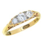 A VICTORIAN THREE STONE DIAMOND RING in gold marked 18ct, 3g, size P++One diamond replaced with a
