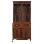 A GEORGE III MAHOGANY, SATINWOOD AND LINE INLAID SECRETAIRE BOOKCASE, C1810 the upper part fitted