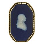 A WEDGWOOD JASPER WARE AND SILVER GILT BROOCH WITH CAMEO OF JOHN WESLEY 3.5 x 2.5 cm,impressed