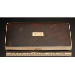 CHARLIE CHAPLIN. A GOLD AND TORTOISESHELL CIGARETTE CASE, DATED 1938 rectangular with milled edge