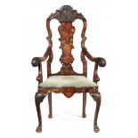 A DUTCH CARVED WALNUT AND MARQUETRY ARMCHAIR, 19TH C the outswept acanthus carved arms terminating