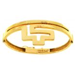 A GREEK GOLD BRACELET DESIGNED BY ILIAS LALAOUNIS 6.3cm l, signed, control mark, Greece 750 A21,
