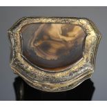 A CONTINENTAL SILVER GILT AND HARDSTONE CARTOUCHE SHAPED SNUFF BOX, PROBABLY GERMAN, MID 18TH C