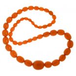 A NECKLACE OF FORTY SEVEN AMBER BEADS 99g++Good condition