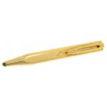 A CARTIER TRIANGULAR 9CT GOLD PROPELLING PENCIL 10.6cm l, signed Cartier with inventory numbers,