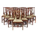 A SET OF TEN MAHOGANY DINING CHAIRS IN GEORGE III STYLE, EARLY 20TH C with leaf carved 'gothick'