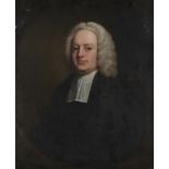 ENGLISH SCHOOL, 18TH CENTURY PORTRAIT OF A CLERGYMAN bust length in a feigned oval, oil on canvas,