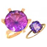 A SYNTHETIC PINK SAPPHIRE COCKTAIL RING the round faceted sapphire 18ct approx, in gold marked