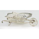 AN EDWARD VII WHEELBARROW NOVELTY SILVER SWEETMEAT BASKET with flared and pierced sides, 21cm l,