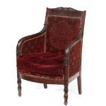 A CHARLES X MAHOGANY ARMCHAIR, C 1830 with carved acanthus decoration, on bulbous forelegs