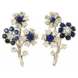 A PAIR OF SAPPHIRE AND DIAMOND BROOCHES each in the form of three flowers composed of old cut
