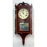 A CARVED AND INLAID WALNUT WALL CLOCK, 85 X 37CM