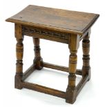 A REPRODUCTION CARVED OAK JOINT STOOL, 50CM H