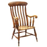 A COUNTRY STYLE ASH ELBOW CHAIR WITH SCROLLING ARMS, EARLY 20TH C