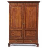 A VICTORIAN MAHOGANY AND LINE INLAID WARDROBE, LATE 19TH C, with dentil cornice enclosed by twin