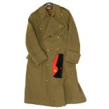 A WWII ROYAL ARTILLERY CAPTAIN'S GREATCOAT AND SIDE CAP