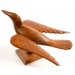 PITCAIRN ISLANDS. AN UNUSUAL CARVED WOOD MODEL OF A BIRD, STAMPED IN PRINTER'S TYPE MADE BY JACOB