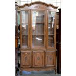 A CARVED WALNUT DISPLAY CABINET, 203CM H X 110CM W