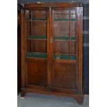 A MAHOGANY BOOKCASE ENCLOSED BY GLAZED DOORS, 154CM H; 92 X 26CM, C1930