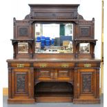 A VICTORIAN CARVED AND PANELLED OAK MIRROR BACK SIDEBOARD, 217CM H; 196 X 60CM