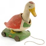 AN ENGLISH PRE-WAR DAINTY TOY PAINTED PAPIER MACHE NODDING DUCK PULL-ALONG TOY WITH TINPLATE WHEELS,